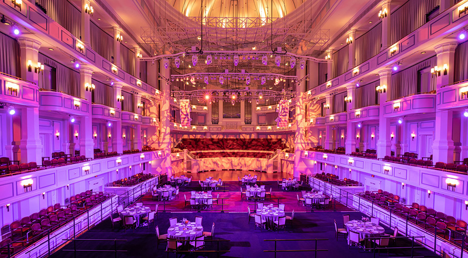 The Palladium concert hall with festival flooring placed above the Orchestra level seating to accomodate tables for a party.