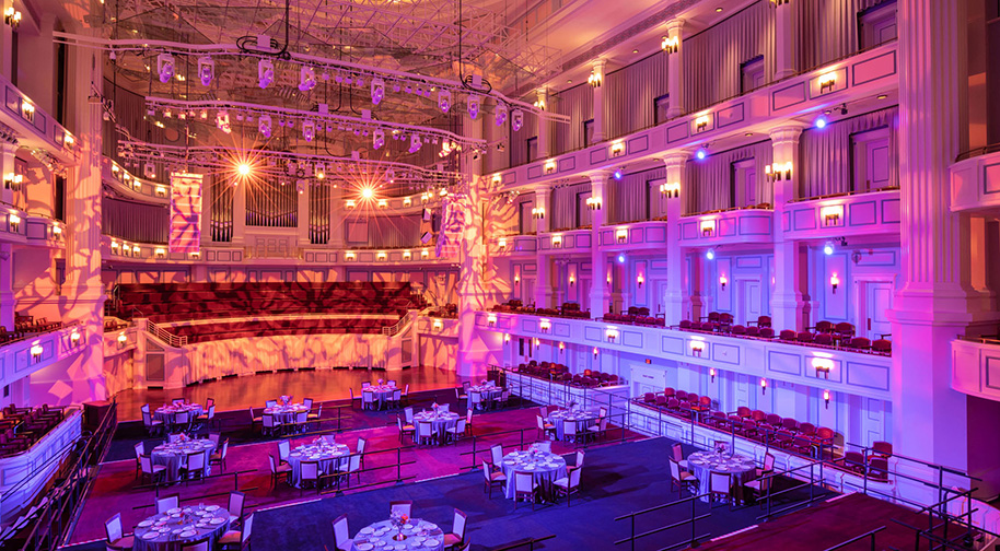 The Palladium concert hall with festival flooring placed above the Orchestra level seating to accomodate tables for a party.