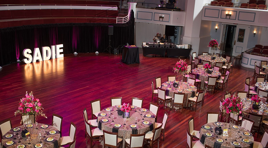 A birthday party takes place on the Palladium stage.