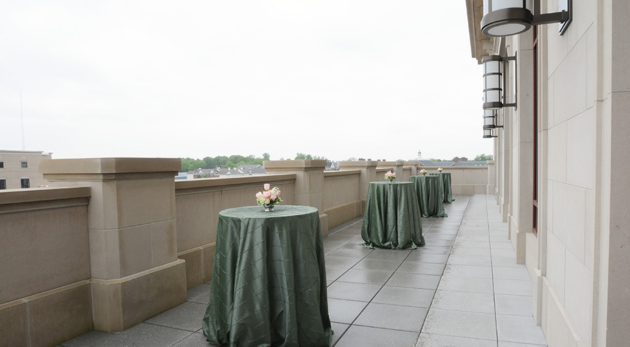 The balcony outside the Palladium's Shiel Sexton Songbook Lounge holds cocktail tables for party attendees.