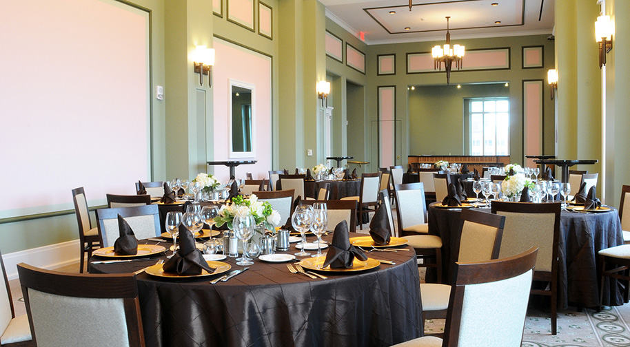 The Shiel Sexton Songbook Lounge at the top level of the Palladium is filled with tables set for dining service.