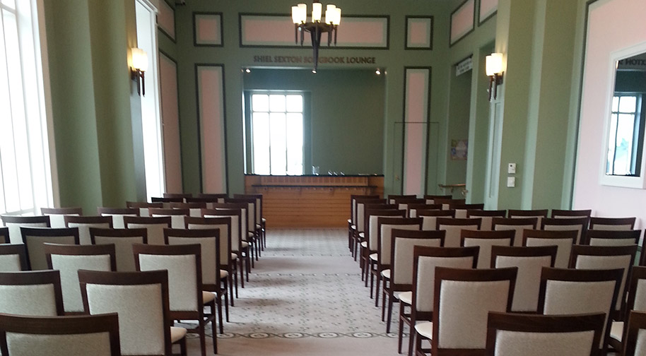 Chairs arranged in the Shiel Sexton Songbook Lounge for a small presentation.